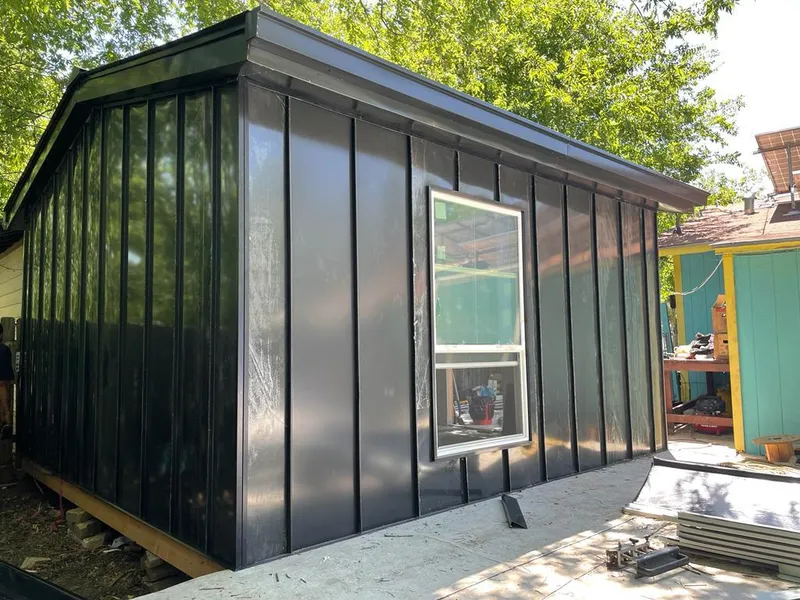 Black standing seam metal wall panels for Roof Inspection in New Haven